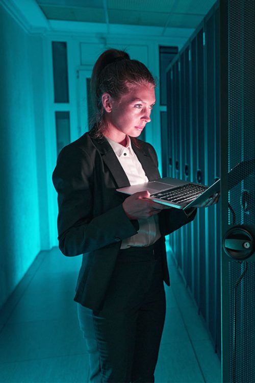 confident-system-administrator-working-on-laptop-i-L83JYCD.jpg